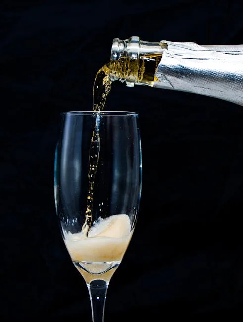 Champagne being poured into a glass